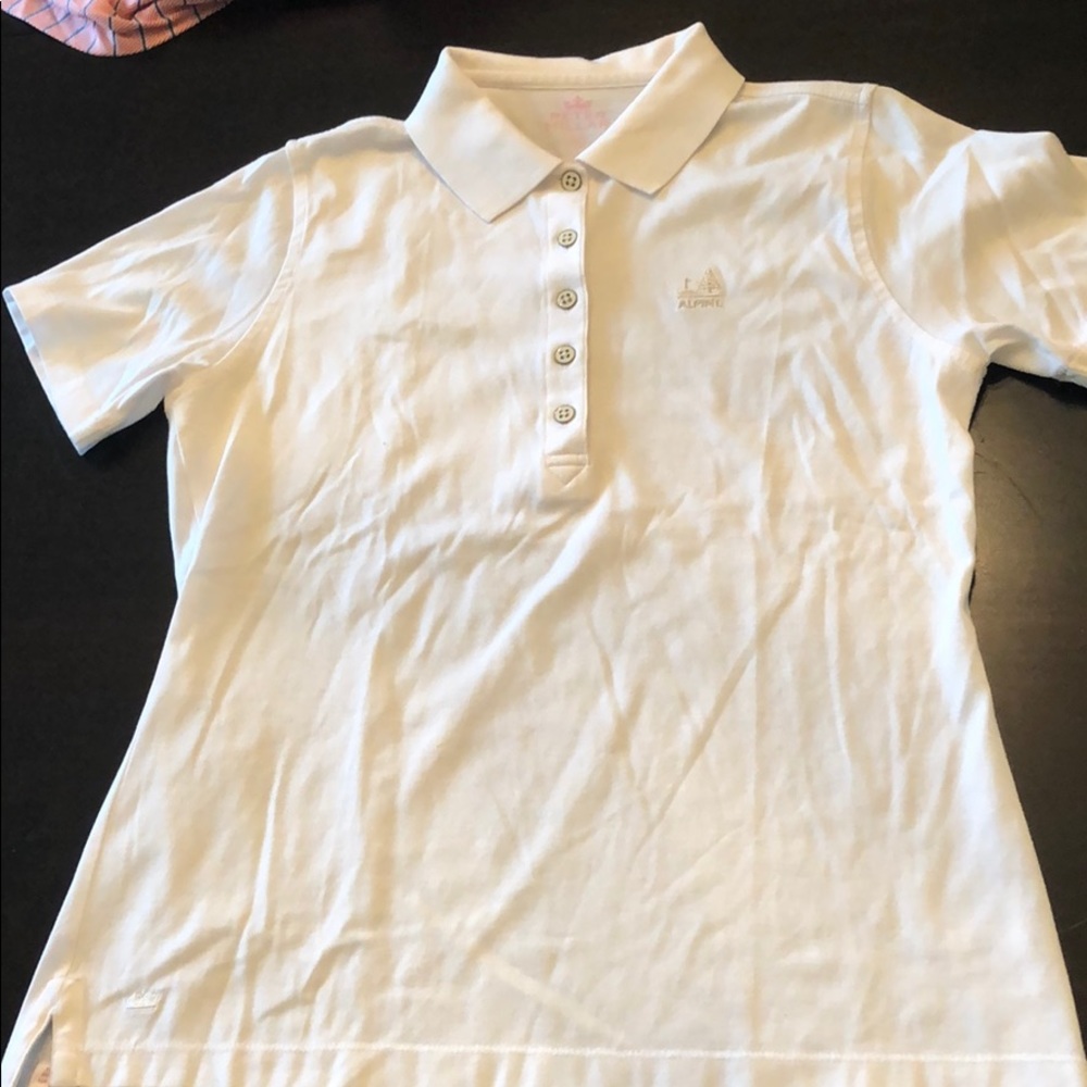 White fitted golf shirt with 5 buttons.